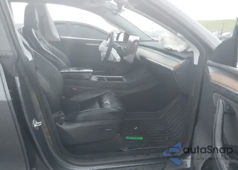 2023 Tesla Model Y из США, поврежденный, VIN 7SAYGDEE5PA128983